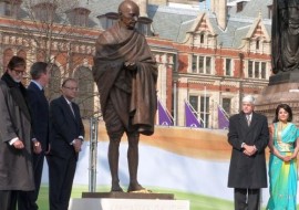 A new statue of Mahatma Gandhi by British sculptor Philip Jackson is unveiled by Finance Minister Arun Jaitley. Also seen are Bollywood actor Amitabh Bachchan, British Prime Minister David Cameron and Gandhi's grandson Gopalkrishna Gandhi, in Parliament Square, London on, Saturday, March 14, 2015.